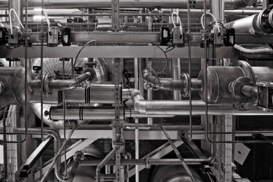 stainless steel and red industrial machine